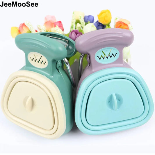 Travel-Friendly Poop Scoop Dispenser™